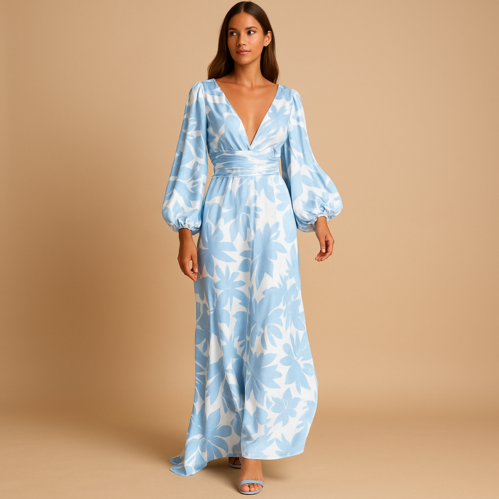 Beautiful floral print maxi dress for women, featuring a flattering wrap style, balloon sleeves & V-neck. Wedding guest outfit.