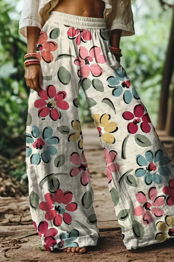 Vibrant floral pattern on women's cropped summer pants, loose and comfortable.