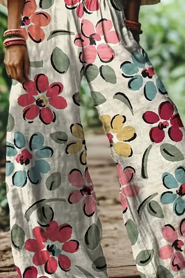 Women's relaxed fit pants with a charming floral print, ideal for everyday summer style.