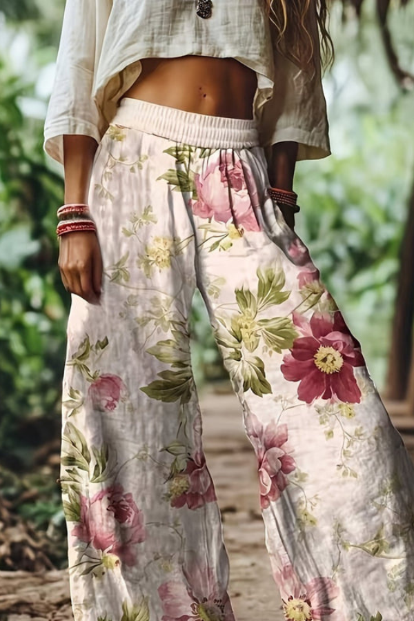 Women's loose floral pants, cropped style, perfect for breezy summer fashion.