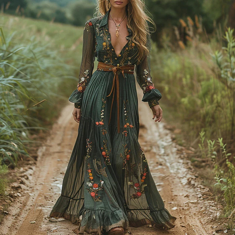Women's floral embroidered boho maxi dress with v-neck & sheer sleeves, perfect for summer vacations & festivals.