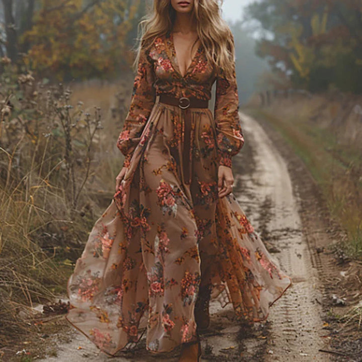 Boho women's summer maxi dress featuring delicate floral embroidery, V-neck, and sheer sleeves for a chic look.