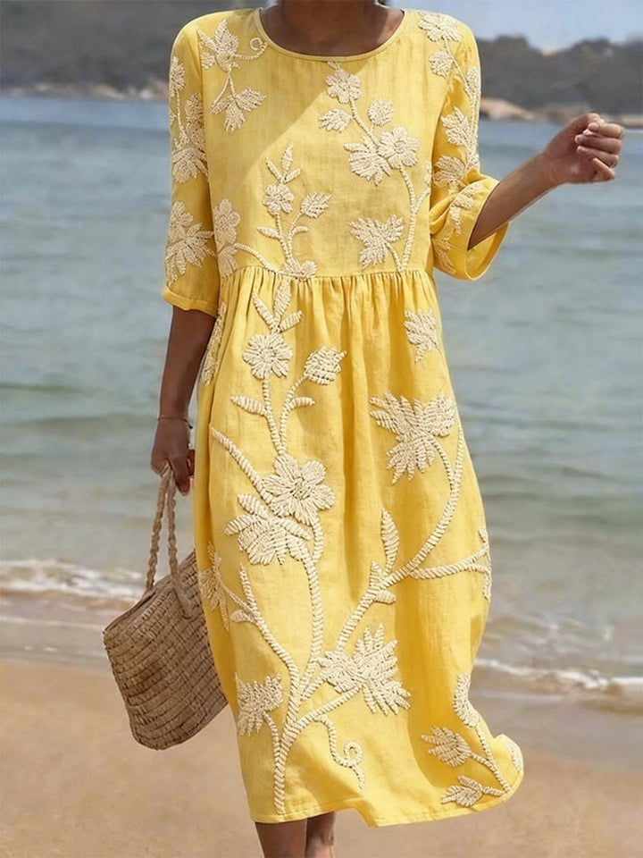 Beautiful women's floral embroidered maxi dress with a graceful flowing silhouette, three-quarter sleeves. Party perfect.