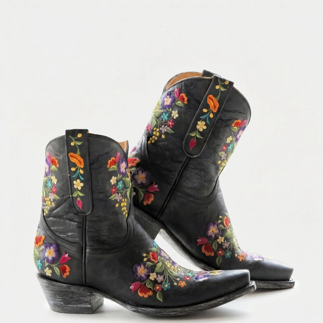 Country chic women's floral embroidered western ankle boots for festival fashion, offering slip-resistant comfort.