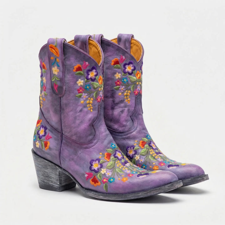 Elegant women's floral embroidered western ankle boots, designed for comfort & style with a distinctive look.