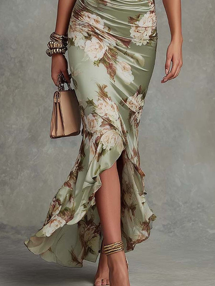 Stylish women's floral fishtail maxi dress with ruched waist & frill sleeves. Perfect elegant evening wear.