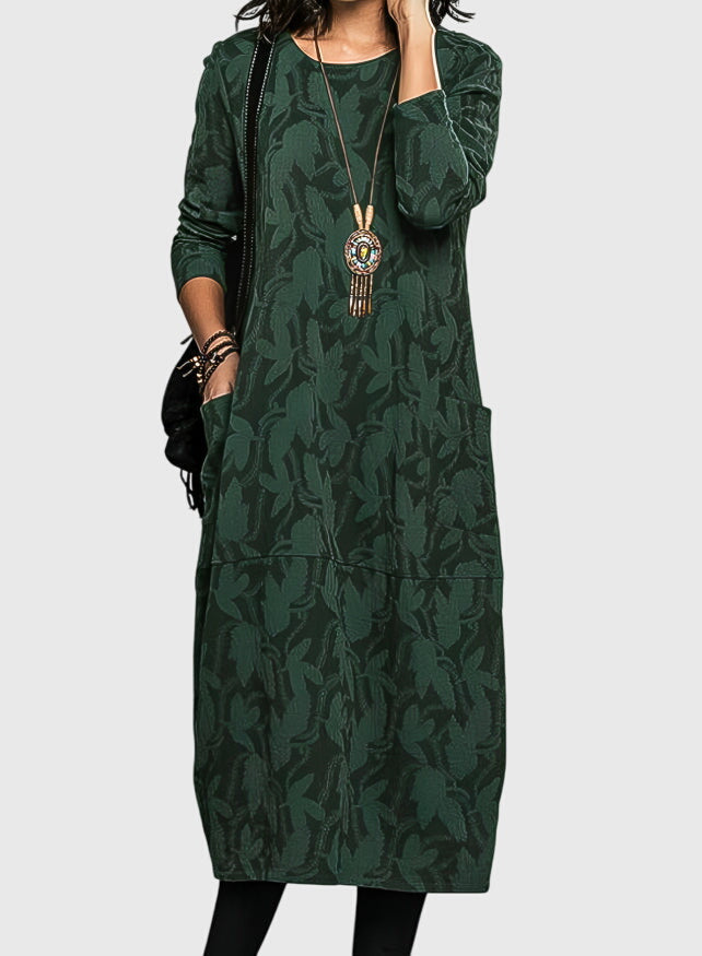 Women's floral jacquard midi dress with long sleeves & practical pockets, perfect for casual everyday wear.