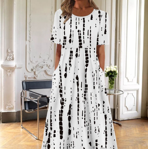 Elegant women's floral midi dress, comfortable short sleeve design, ideal for spring and summer day wear.