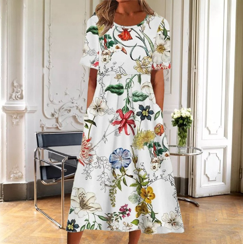 Vibrant floral print midi dress for women, featuring short sleeves & a flattering flared silhouette. Versatile fashion.