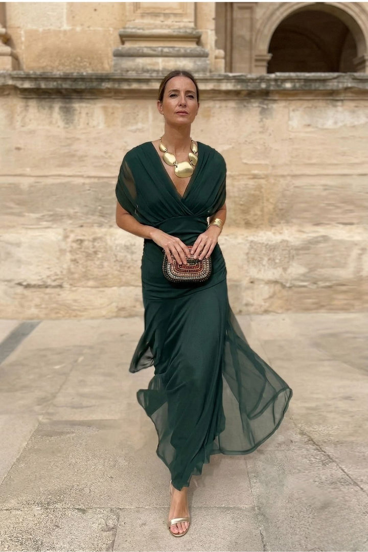 Women's ruched floral maxi dress, off-shoulder style, perfect for summer parties.