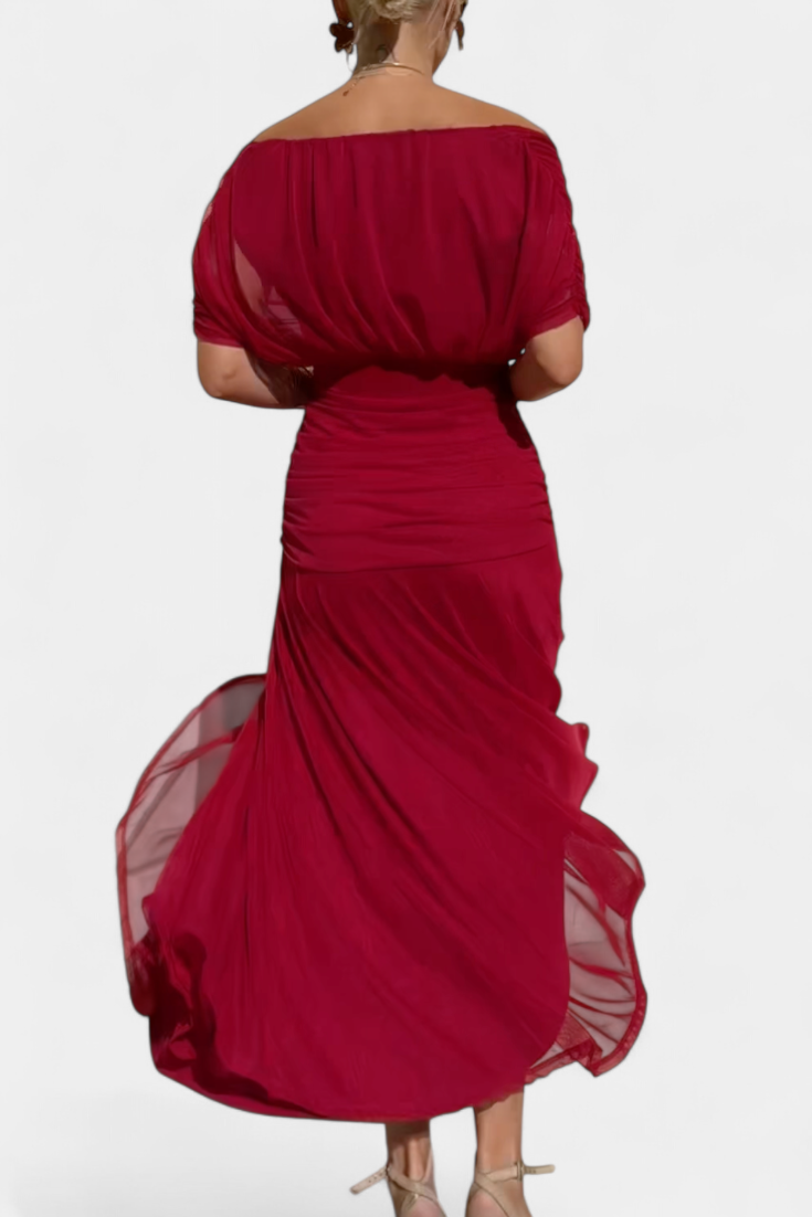 Floral print women's maxi dress with off-shoulder cut and flattering ruched details.
