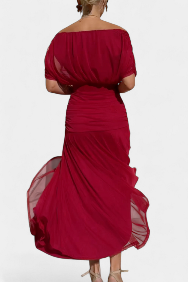 Floral print women's maxi dress with off-shoulder cut and flattering ruched details.