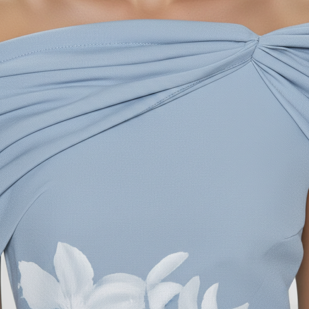 Sophisticated women's midi dress featuring a beautiful floral print & chic off-shoulder neckline. Ideal for summer events.