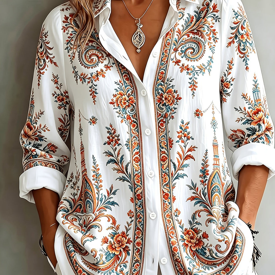 Women's long sleeve top with captivating floral paisley pattern, highly versatile.