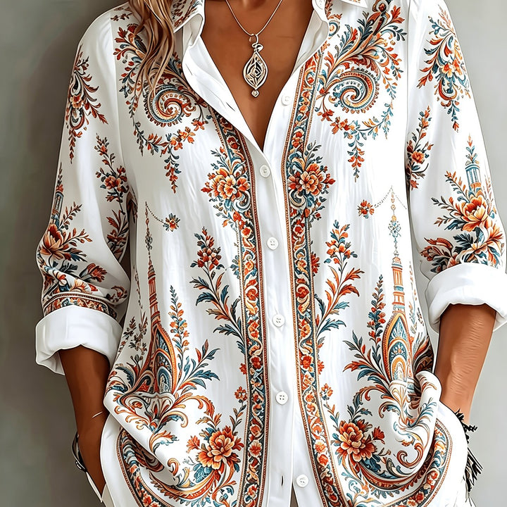 Women's long sleeve top with captivating floral paisley pattern, highly versatile.