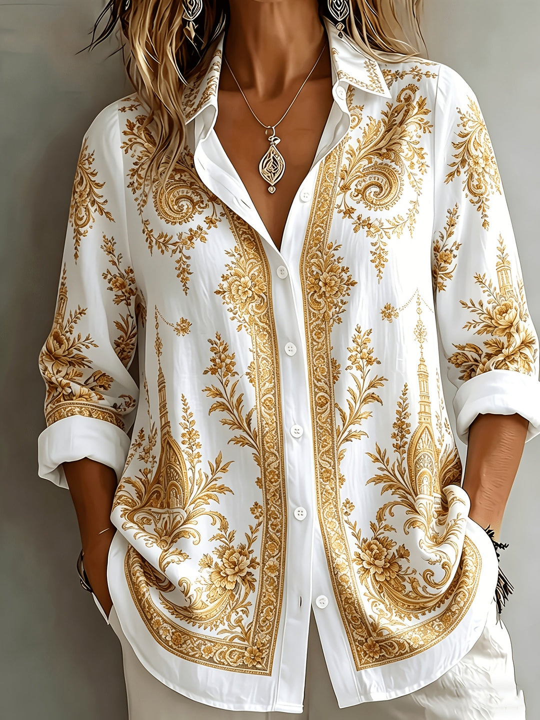 Oversized floral paisley button-down shirt for women, relaxed fit and stylish.