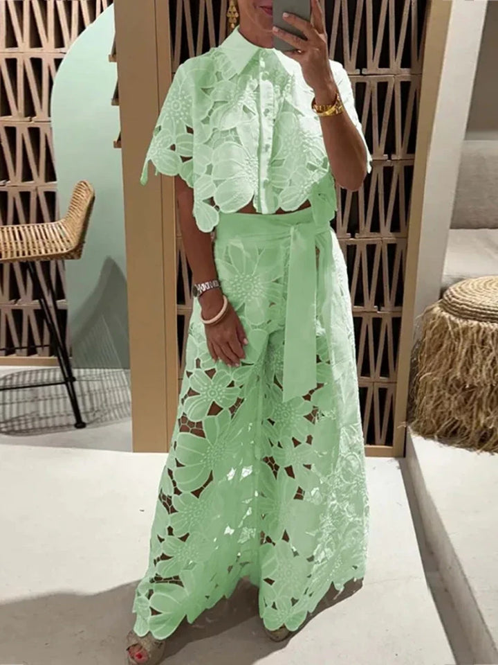 Floral pattern wide leg pants & cropped top women's two-piece set. Versatile summer fashion, casual to elegant.