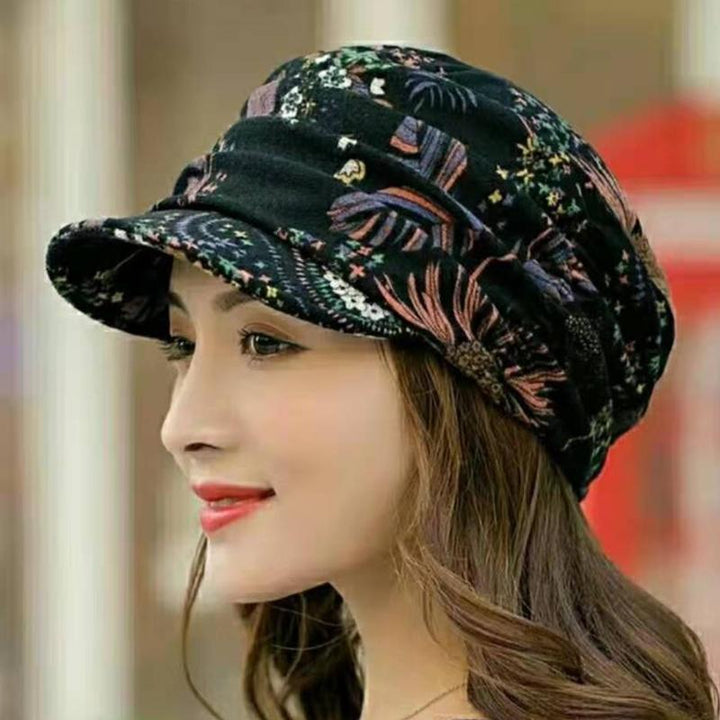 Group of women's floral pleated short brim caps in various colors, stylish headwear selection.