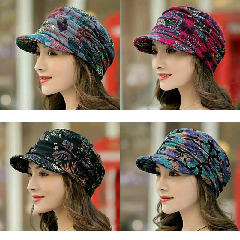 Back view of a women's pleated cap with a subtle floral design, ideal for winter fashion.