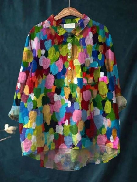 Feminine floral long sleeve blouse. Women's button-up top, great for spring/summer fashion.