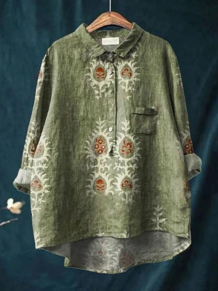 Dressy casual women's floral button-up blouse. Collared, long sleeve, perfect for everyday wear.