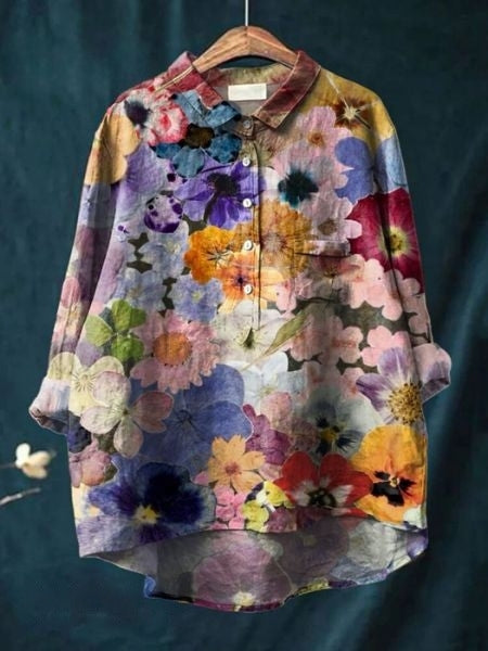 Women's relaxed fit floral button-up blouse. Long sleeve, ideal for spring & summer.