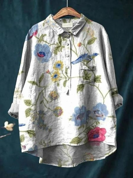 Flowy floral print long sleeve blouse for women. Button-up casual top, suitable for summer.