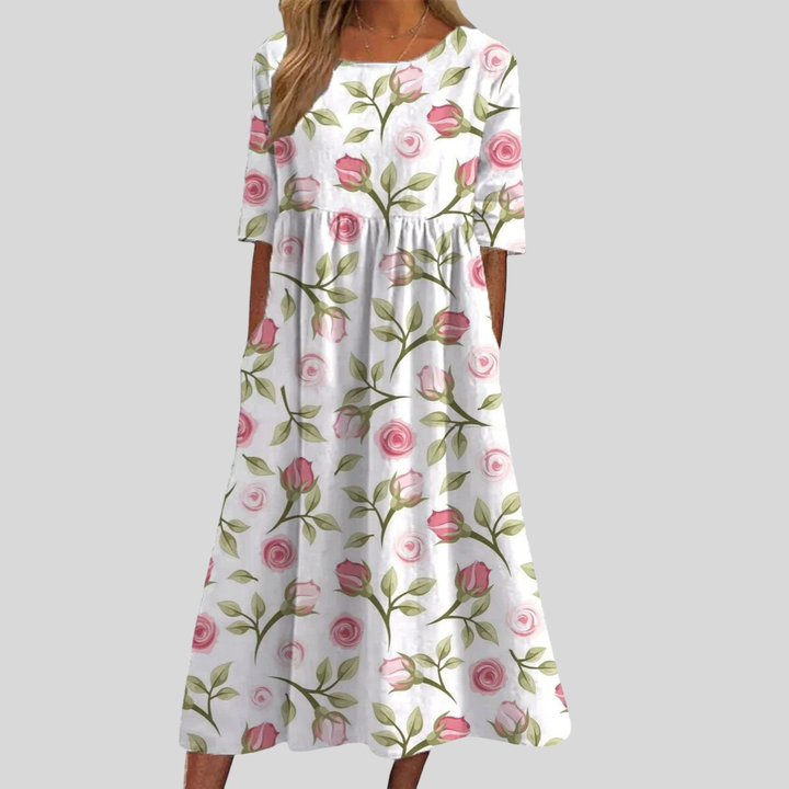 Versatile women's floral midi dress, empire waist and pockets, ideal for spring fashion and summer casual.