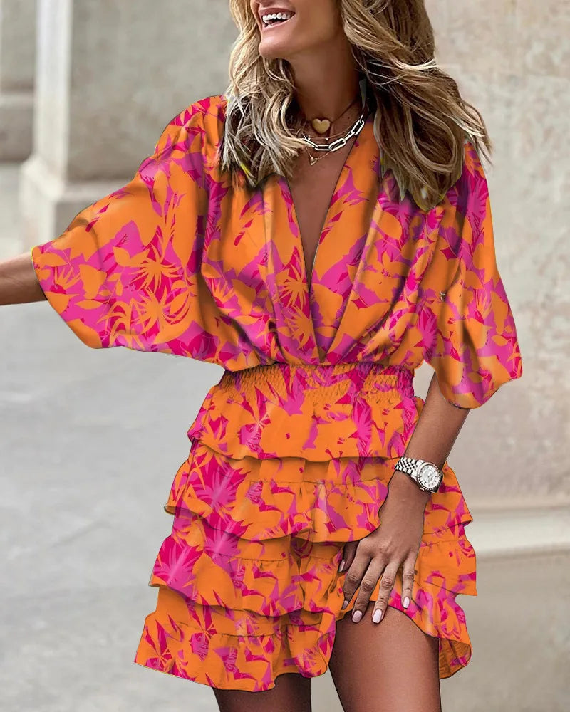 Beautiful floral print wrap dress for women, with elegant long sleeves and a flowing tiered ruffle midi skirt.