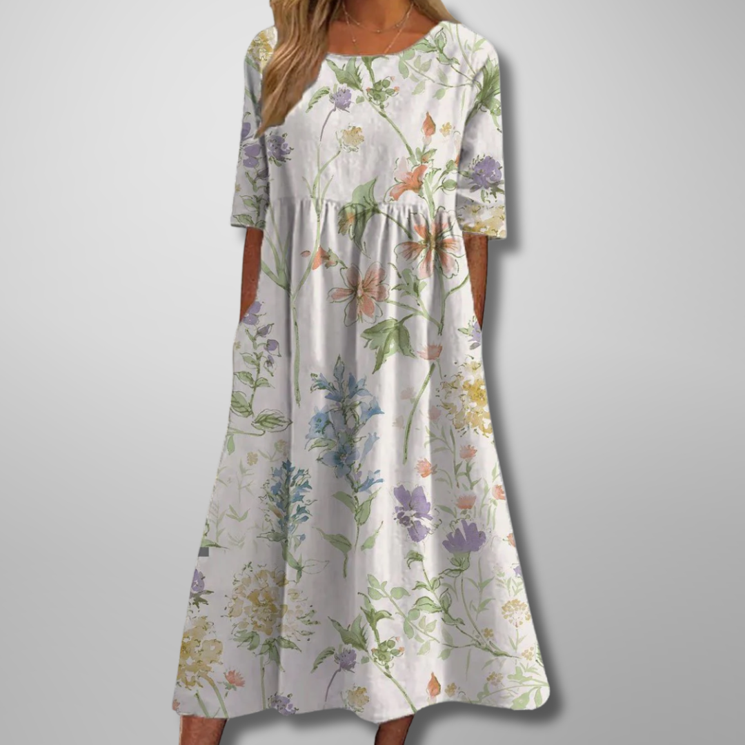 Casual summer women's midi dress, short-sleeved, featuring a beautiful all-over floral print & comfortable loose fit.