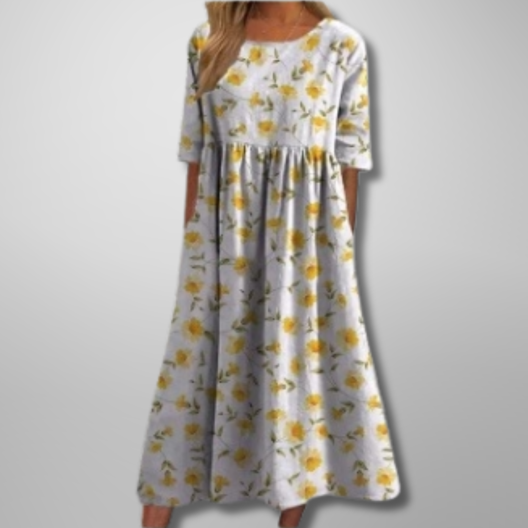 Versatile women's botanical print midi dress with short sleeves, loose fit. Ideal for casual, comfortable summer days.
