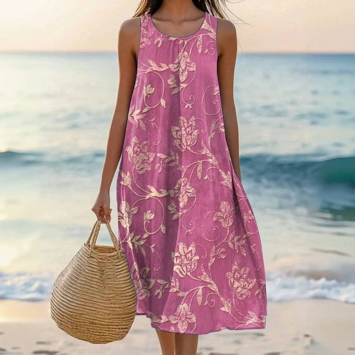 Women's floral print midi dress, sleeveless & loose fit. Perfect casual summer dress for effortless style & comfort.