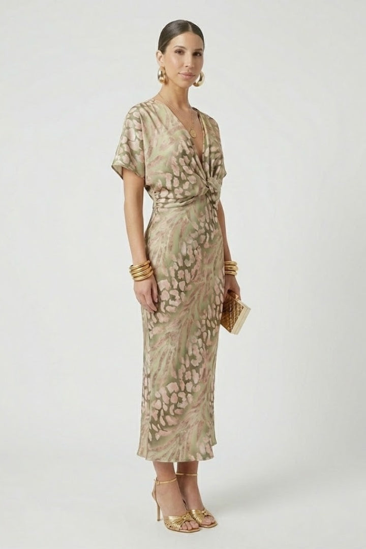 Vibrant floral print midi dress for women, with a flattering pleated skirt and short sleeves, suitable for parties.