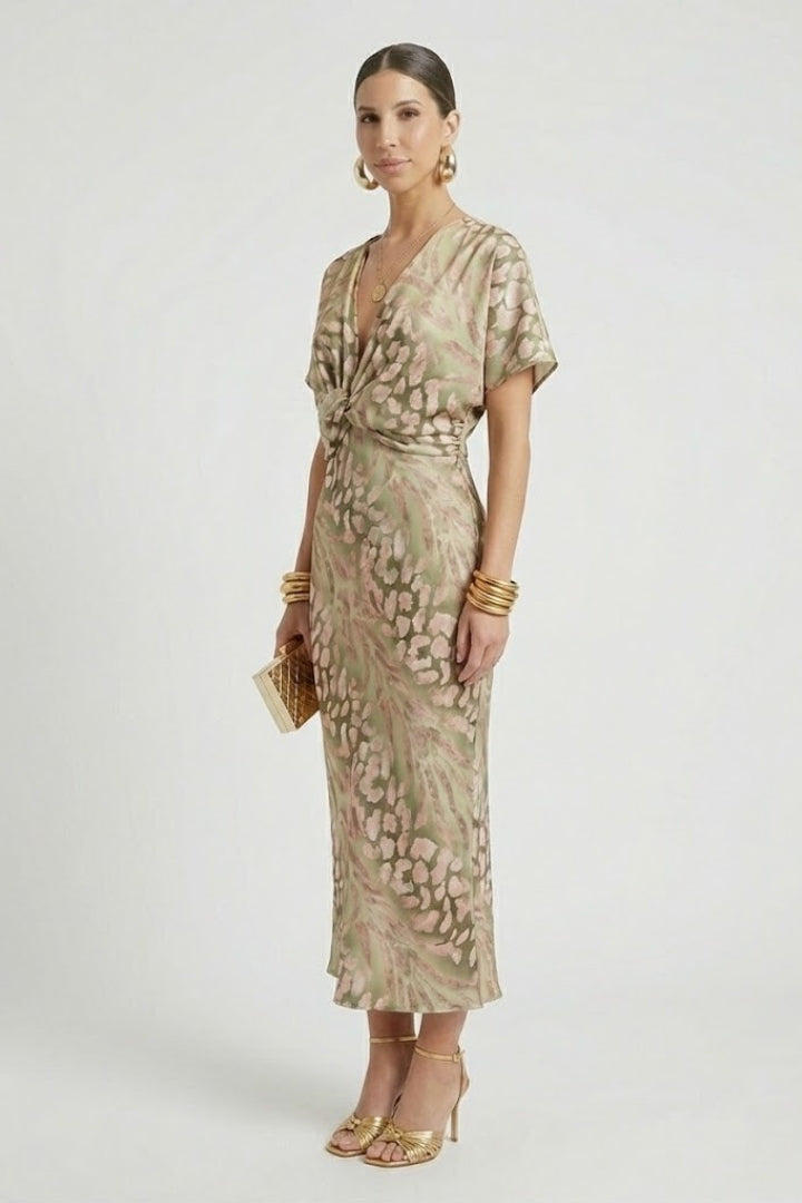 Women's short-sleeve V-neck floral midi dress with elegant pleated skirt, ideal for parties & summer events.