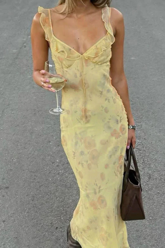 Women's floral print spaghetti strap maxi slip dress. Perfect for summer, beach, or casual elegant wear.