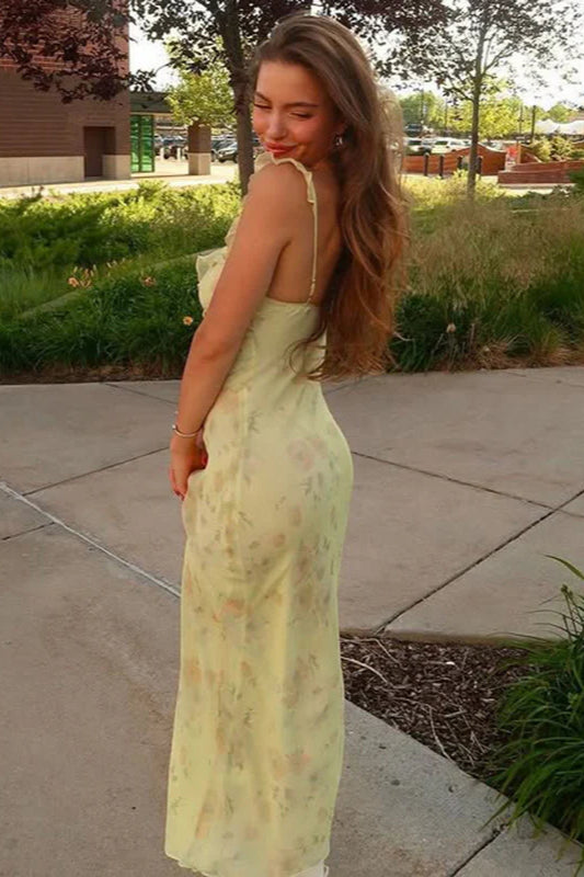 Flowy floral print women's slip maxi dress with thin spaghetti straps, ideal for elegant summer and beach wear.