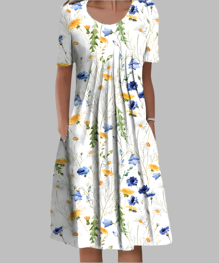 Elegant women's floral midi dress, short sleeves & round neck. Ideal plus size summer outfit for comfort.