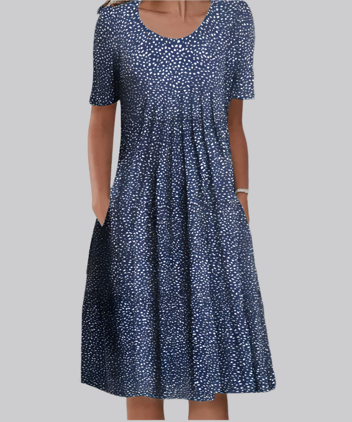 Beautiful women's floral print midi dress, short sleeves, flattering fit. A chic choice for any casual event.