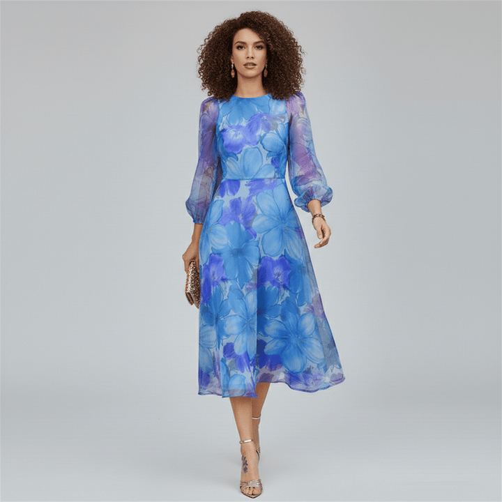 Stunning women's floral midi dress with puff sleeves & A-line design. Perfect wedding guest or party dress.