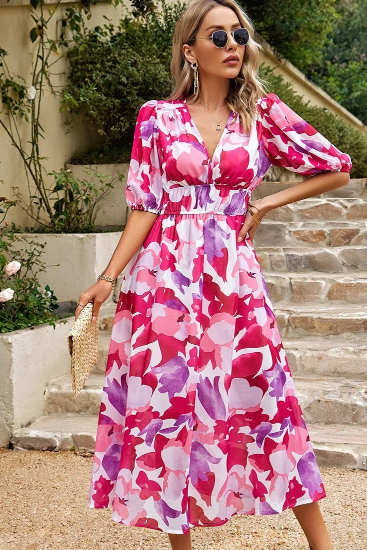 Vibrant floral pattern on a flowing women's midi dress. Ideal for casual, party, or special occasion wear.