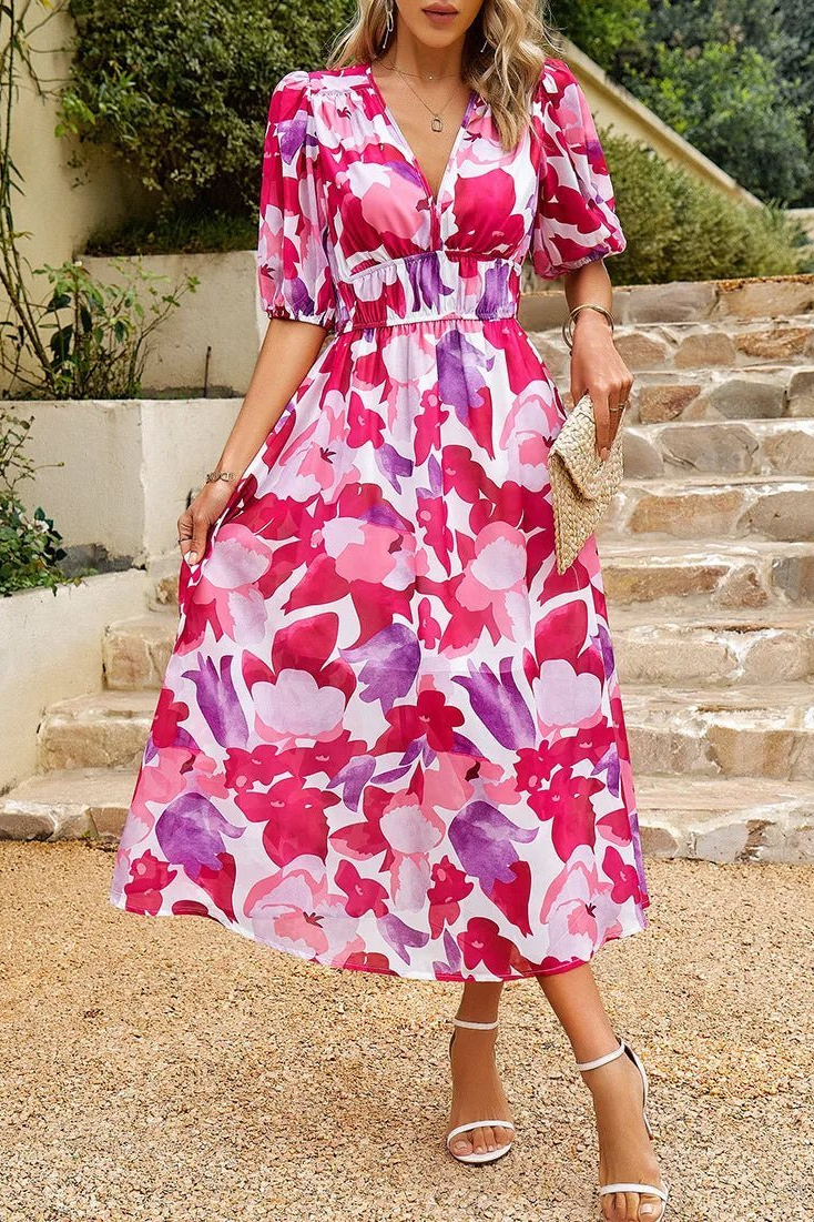 Elegant V-neck design of a women's floral puff sleeve midi dress. Versatile for summer parties & casual outings.