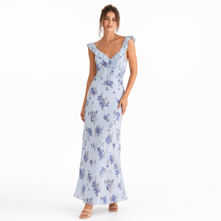 Casual women's backless floral beach dress. Sleeveless, ideal for warm weather, summer, & vacation.