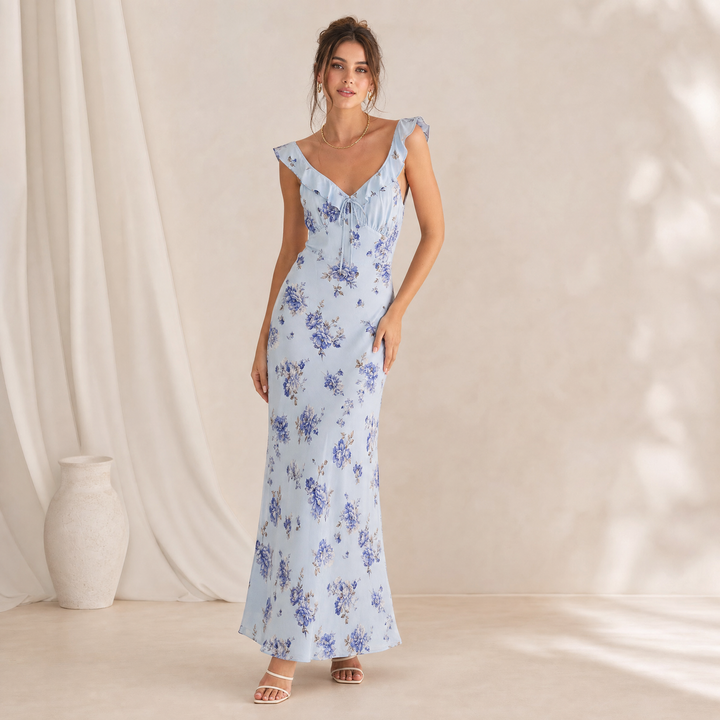 Flowy women's floral sleeveless beach dress for summer. Backless, comfortable resort wear sundress.