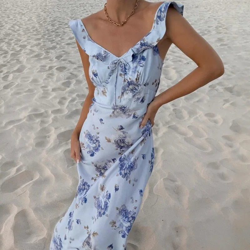 Lightweight women's floral sundress. Sleeveless, backless design for stylish, comfortable warm weather fashion.