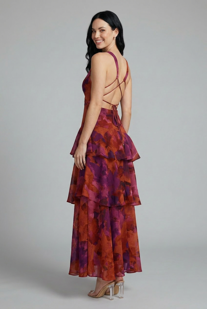 Flowy women's floral print tiered maxi dress, sleeveless with a stylish v-neck for summer elegance.