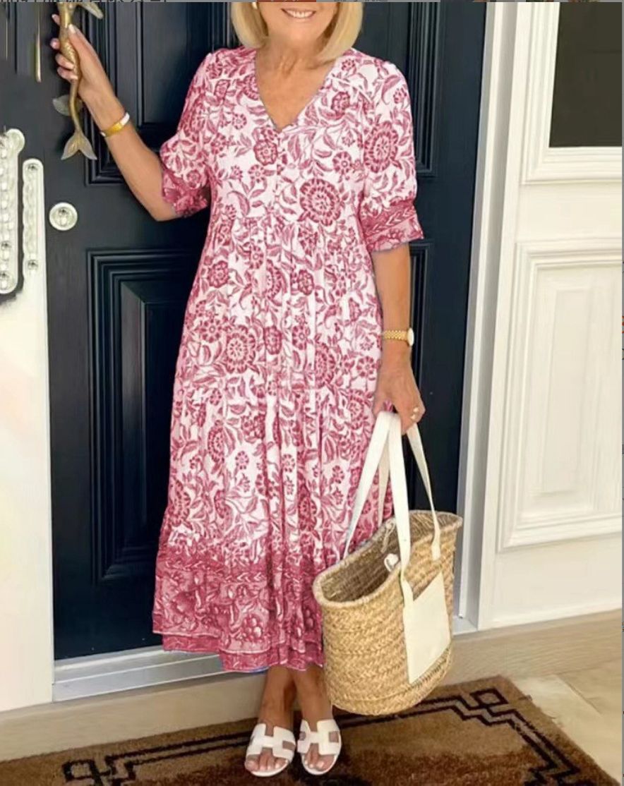 Flowy short-sleeve women's floral midi dress, a comfortable and stylish V-neck A-line design for spring fashion.