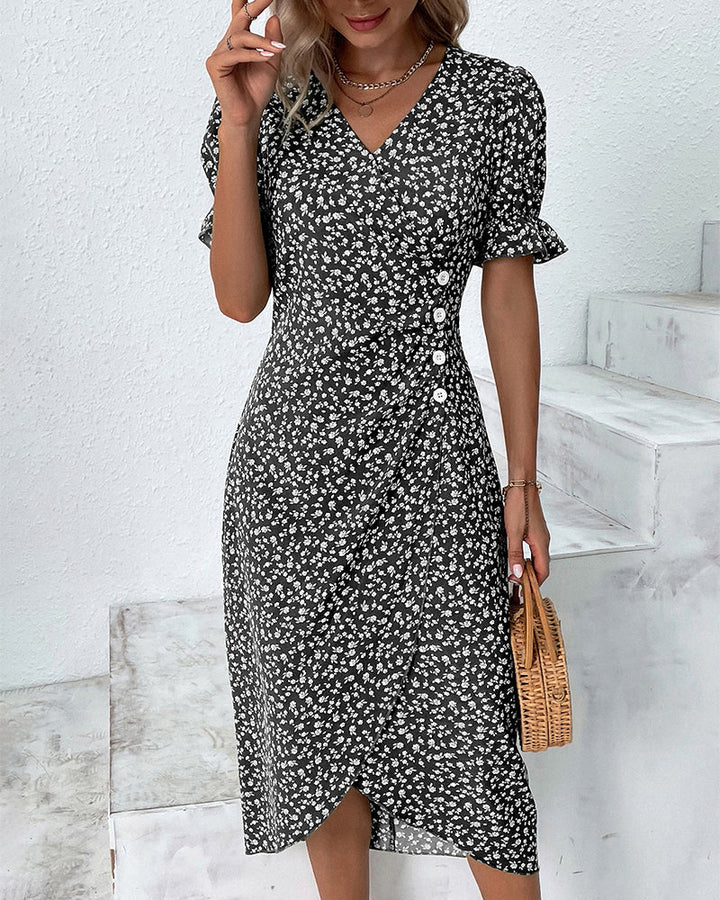 Blue floral V-neck flowy maxi dress. Elegant women's summer fashion, ideal for parties.