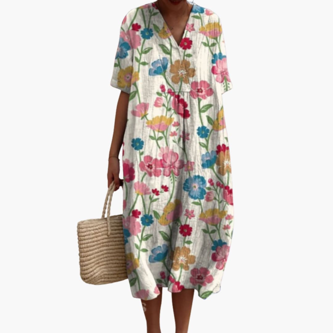 Women's floral V-neck midi dress, short sleeve, oversized casual fit, perfect for summer and vacation.