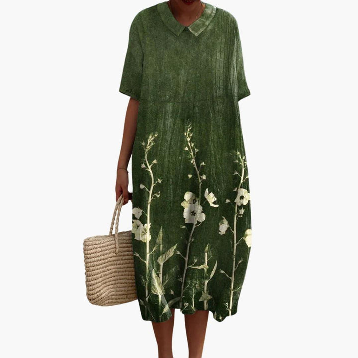 Relaxed fit women's floral midi dress, V-neck, short sleeve, ideal for casual summer or vacation wear.