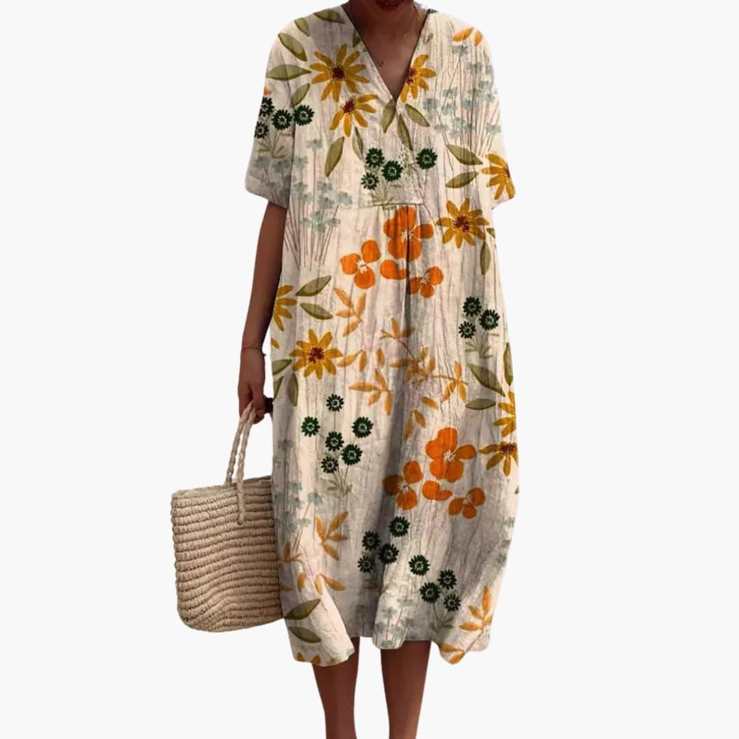 Plus size women's floral midi dress, V-neck, short sleeve, casual oversized fit, perfect for summer vacation.